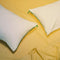 Two Marlow Pillows on yellow sheets